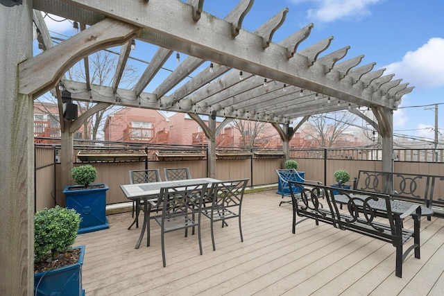 wooden terrace with a pergola