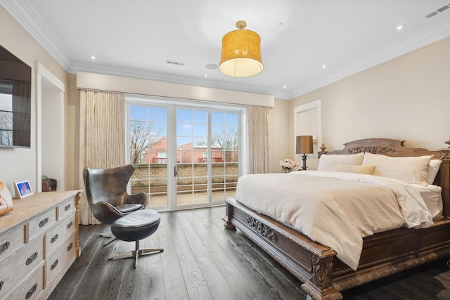 bedroom featuring ornamental molding, dark hardwood / wood-style floors, and access to outside