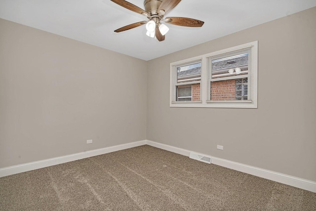 unfurnished room with ceiling fan and carpet flooring