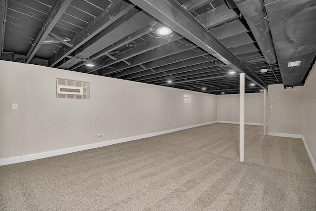 basement featuring carpet floors