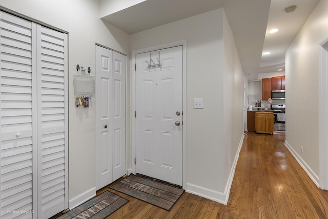 foyer with light hardwood / wood-style floors