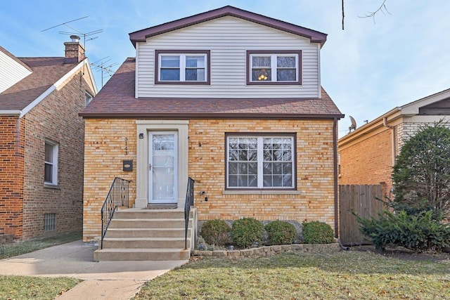 view of front of house with a front lawn