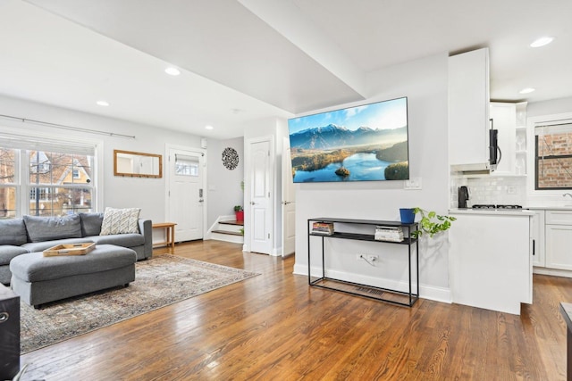 living room featuring dark hardwood / wood-style flooring