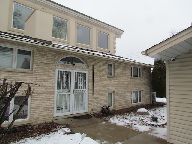 view of snow covered property