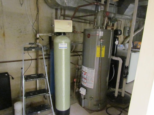 utility room featuring gas water heater