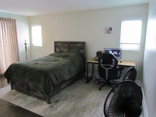 bedroom featuring hardwood / wood-style floors