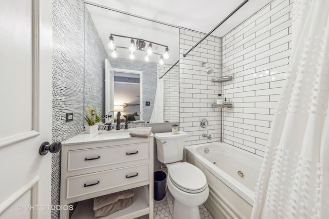 full bathroom with vanity, shower / tub combo with curtain, and toilet