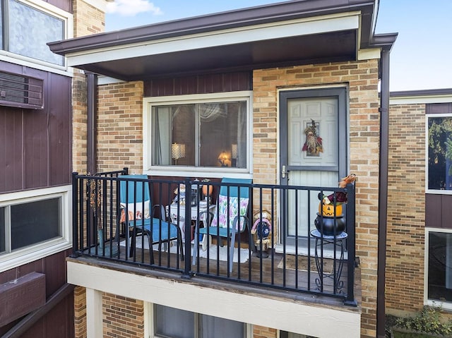 doorway to property featuring a balcony