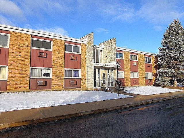 view of snow covered building