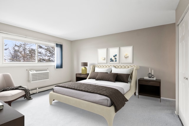 bedroom featuring a baseboard heating unit, a wall mounted air conditioner, light colored carpet, and a closet