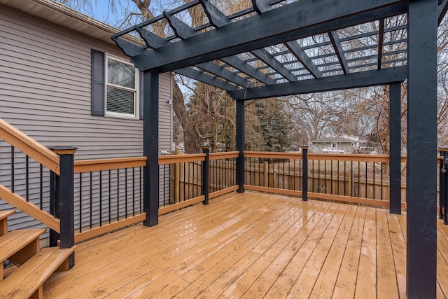 wooden deck featuring a pergola