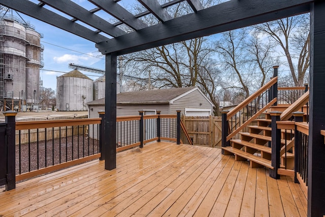 wooden deck featuring a pergola