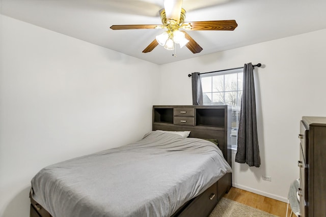 bedroom featuring ceiling fan and light hardwood / wood-style floors