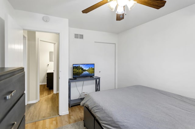 bedroom with ceiling fan and light wood-type flooring