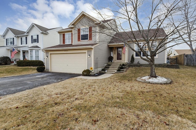 front of property with a garage and a front yard