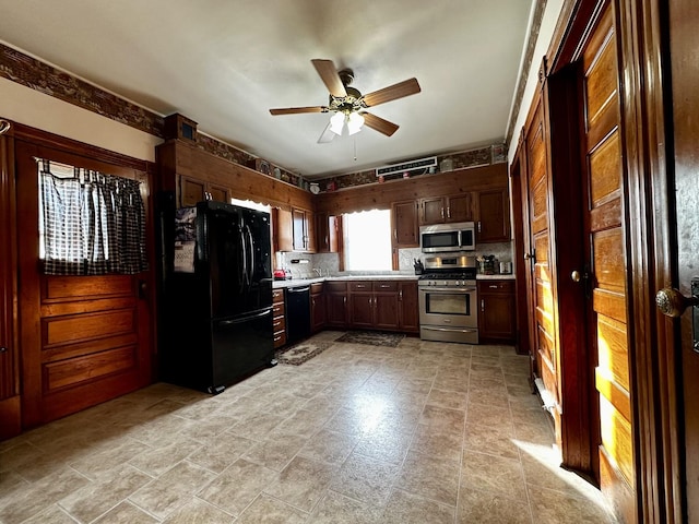 kitchen featuring tasteful backsplash, ceiling fan, and black appliances