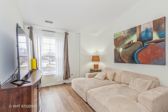 living room with light hardwood / wood-style floors