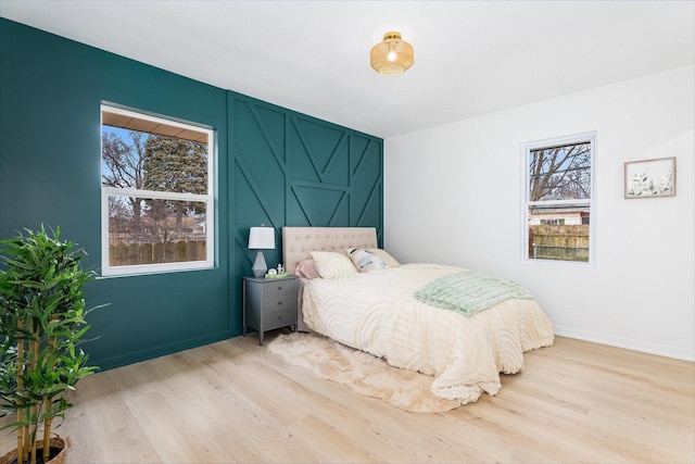 bedroom featuring light wood-type flooring