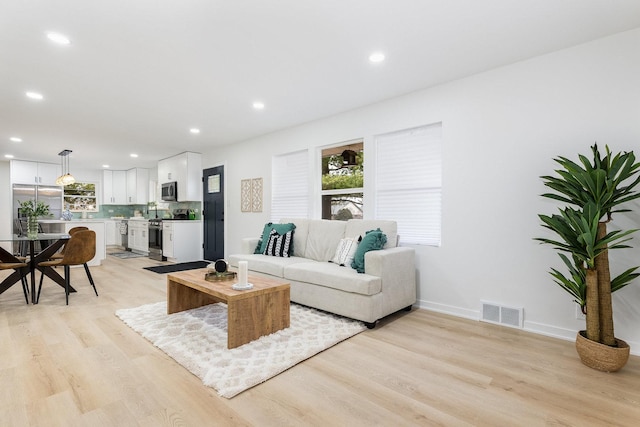 living room featuring light hardwood / wood-style flooring