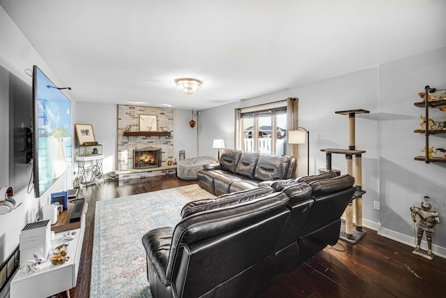 living room featuring a fireplace and dark hardwood / wood-style floors