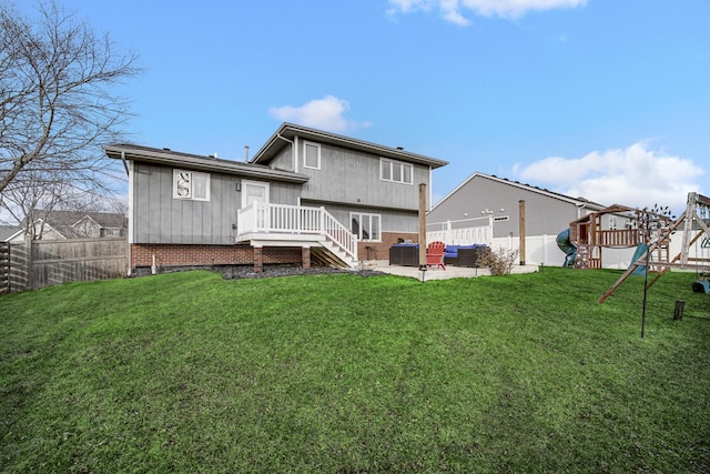 back of property featuring a lawn, outdoor lounge area, central AC unit, a patio area, and a playground