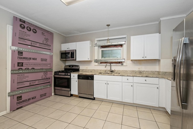 kitchen with white cabinetry, sink, hanging light fixtures, and appliances with stainless steel finishes