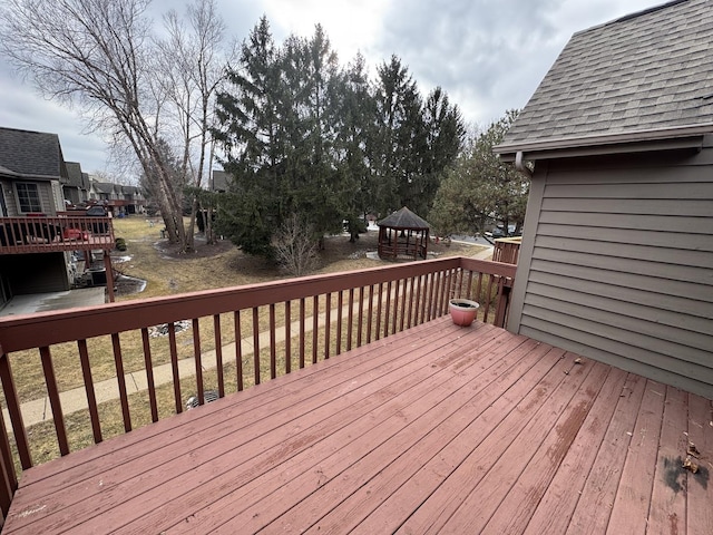 wooden deck with a gazebo