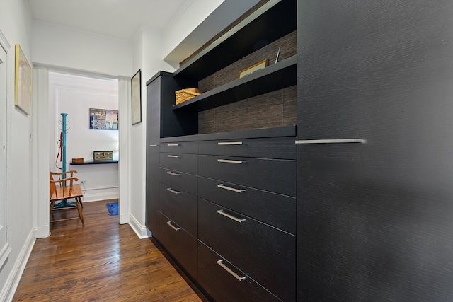 corridor featuring dark wood-type flooring