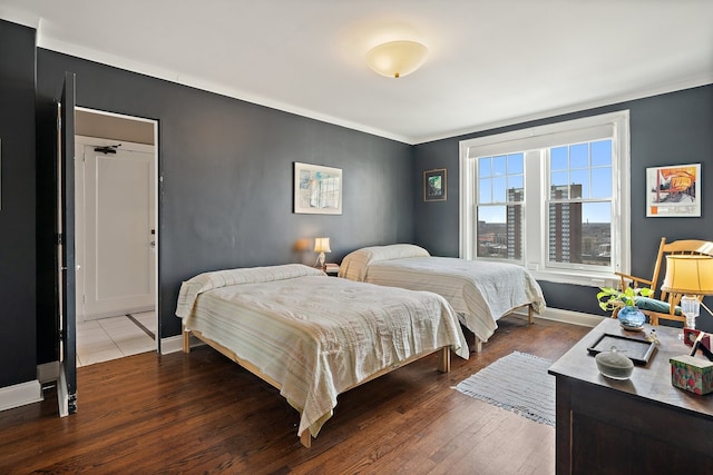 bedroom featuring hardwood / wood-style flooring