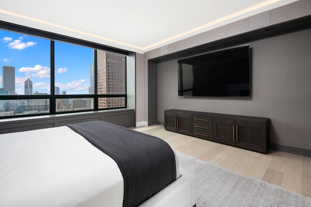 bedroom with light wood-type flooring