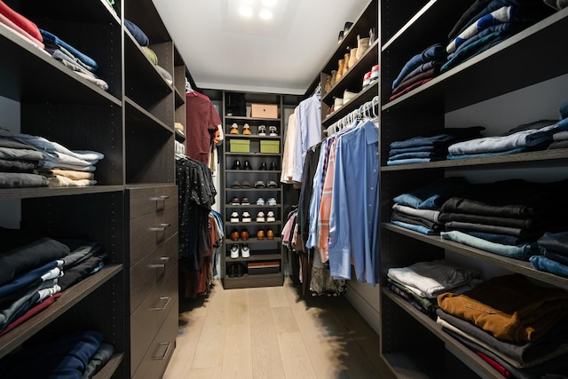 walk in closet featuring light wood-type flooring