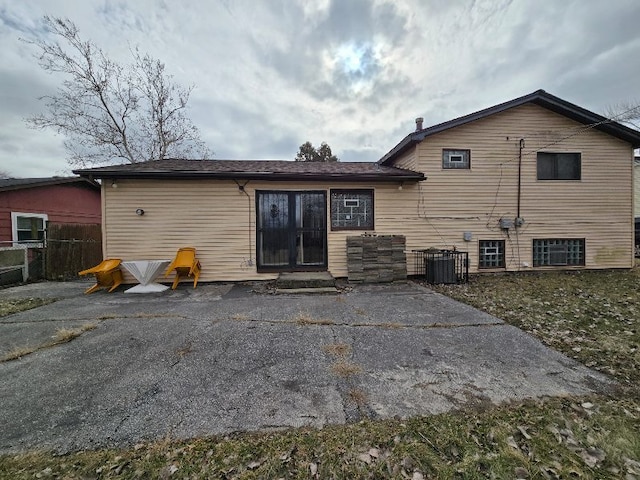 611 Andover St, Chicago Heights, IL 60411 - back of house with central AC and a patio