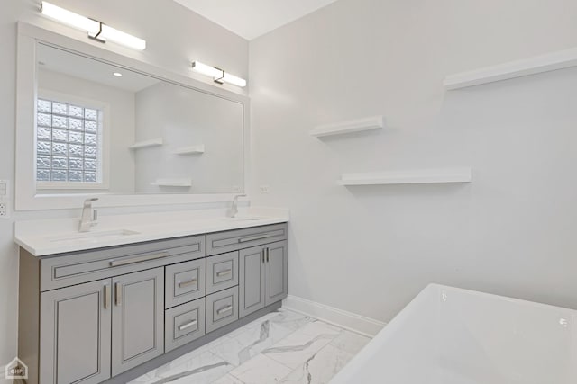 bathroom featuring vanity and a bathing tub