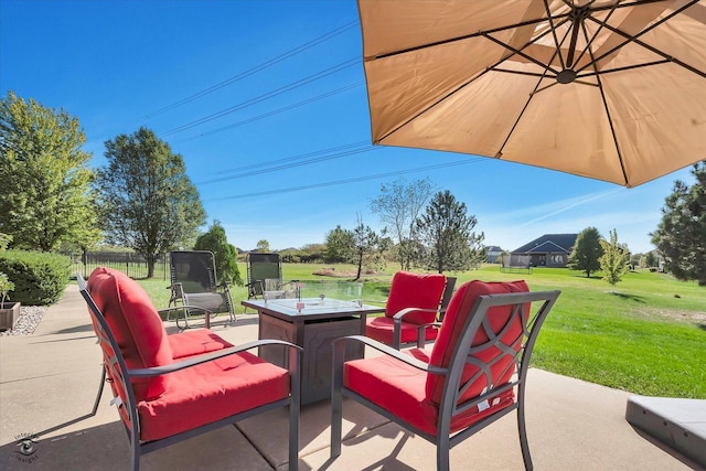 view of patio with a fire pit