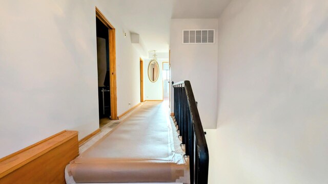 9018 S Oakley Ave, Chicago, IL 60643 - corridor featuring an upstairs landing and baseboards