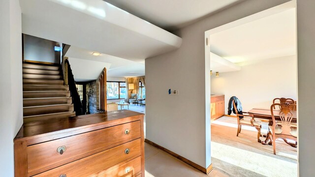 9018 S Oakley Ave, Chicago, IL 60643 - corridor with baseboards, stairs, and light carpet