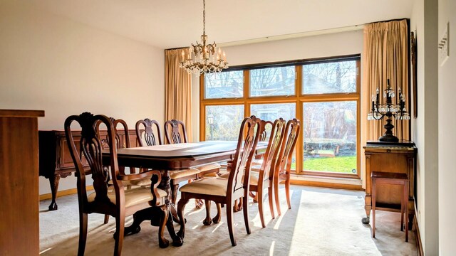 9018 S Oakley Ave, Chicago, IL 60643 - carpeted dining space featuring a chandelier