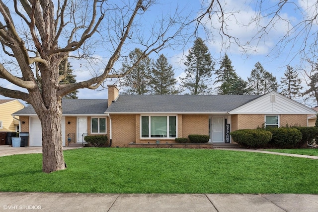 single story home with a garage and a front lawn