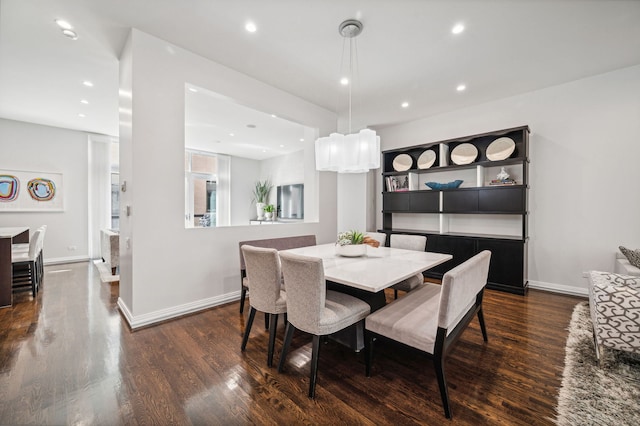 dining room featuring dark hardwood / wood-style flooring