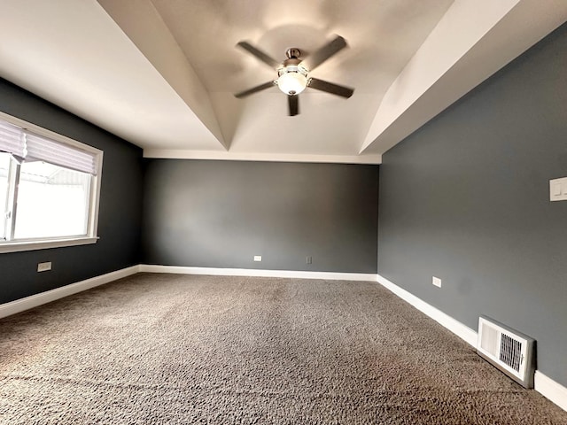 additional living space with ceiling fan and carpet flooring