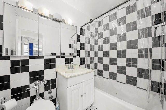 full bathroom featuring vanity, tile walls, shower / tub combo, and toilet