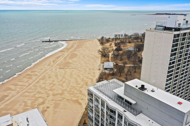 bird's eye view with a beach view and a water view