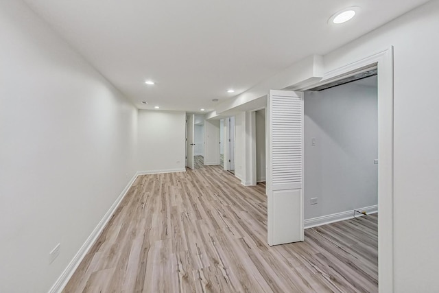 basement with light wood-type flooring