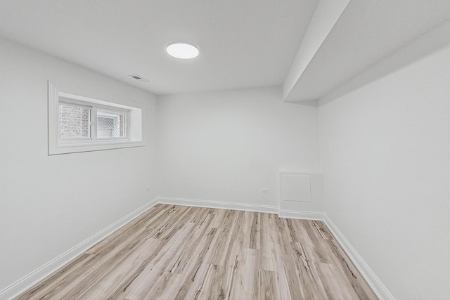 empty room with light wood-type flooring