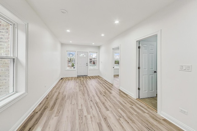 entrance foyer featuring light hardwood / wood-style floors