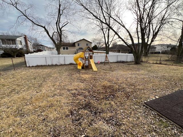 view of yard featuring a playground