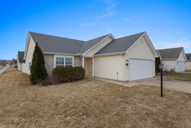 ranch-style home with a garage and a front yard