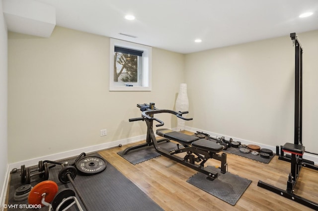 workout area featuring wood-type flooring