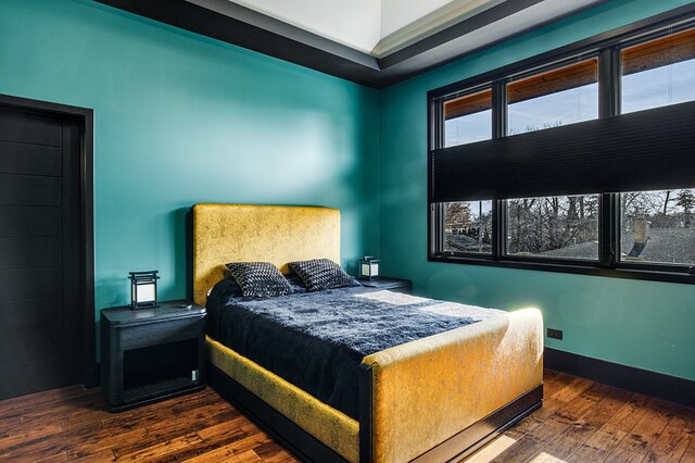 6505 N Knox Ave, Lincolnwood, IL 60645 - bedroom with baseboards and hardwood / wood-style floors