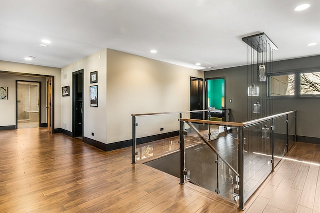 6505 N Knox Ave, Lincolnwood, IL 60645 - rec room with baseboards, wood finished floors, and recessed lighting